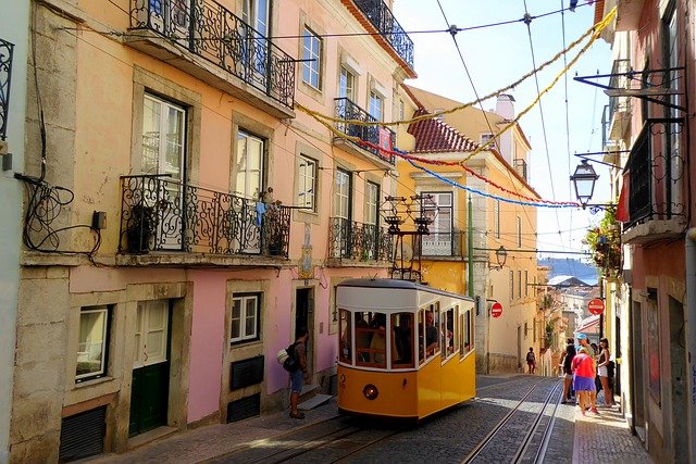 colourful tram on hill Lisbon