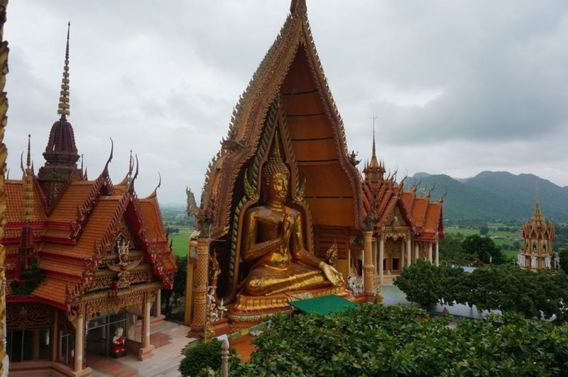 Tiger Cave Temple with giant Gold Buddah Statue
